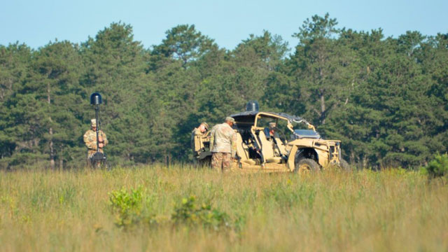 Soldiers set up Spectrum Situational Awareness System (S2AS). (Photo Credit: Shawn Nesaw, PEO IEW&S Strategic Communications)