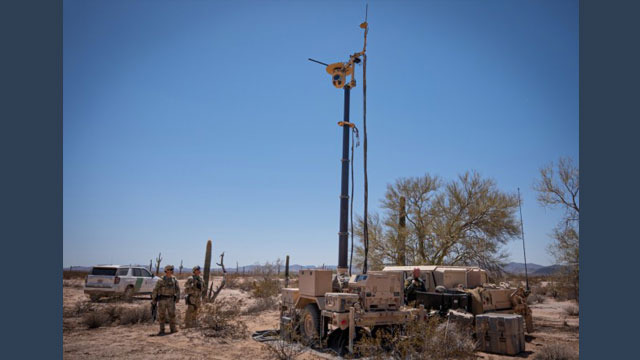 U.S. Soldiers from 23rd Military Police Company, 759th Military Police Battalion, assigned to Joint Task Force - Southern Border and a Border Patrol agent conduct screening operations using the Ground-Based Operational Surveillance System (Expeditionary) (G-BOSS(E)), in Wellton, Arizona on April 23, 2025. Under the direction of U.S. Northern Command, Joint Task Force – Southern Border aligns efforts to seal the southern border and repel illegal activity and is responsible for full-scale, agile, and all-domain operations, which will allow for more effective and efficient DoD operations. (U.S. Army photo by 2nd Lt. Erica Esterly) (Photo Credit: 2nd Lt. Erica Esterly)